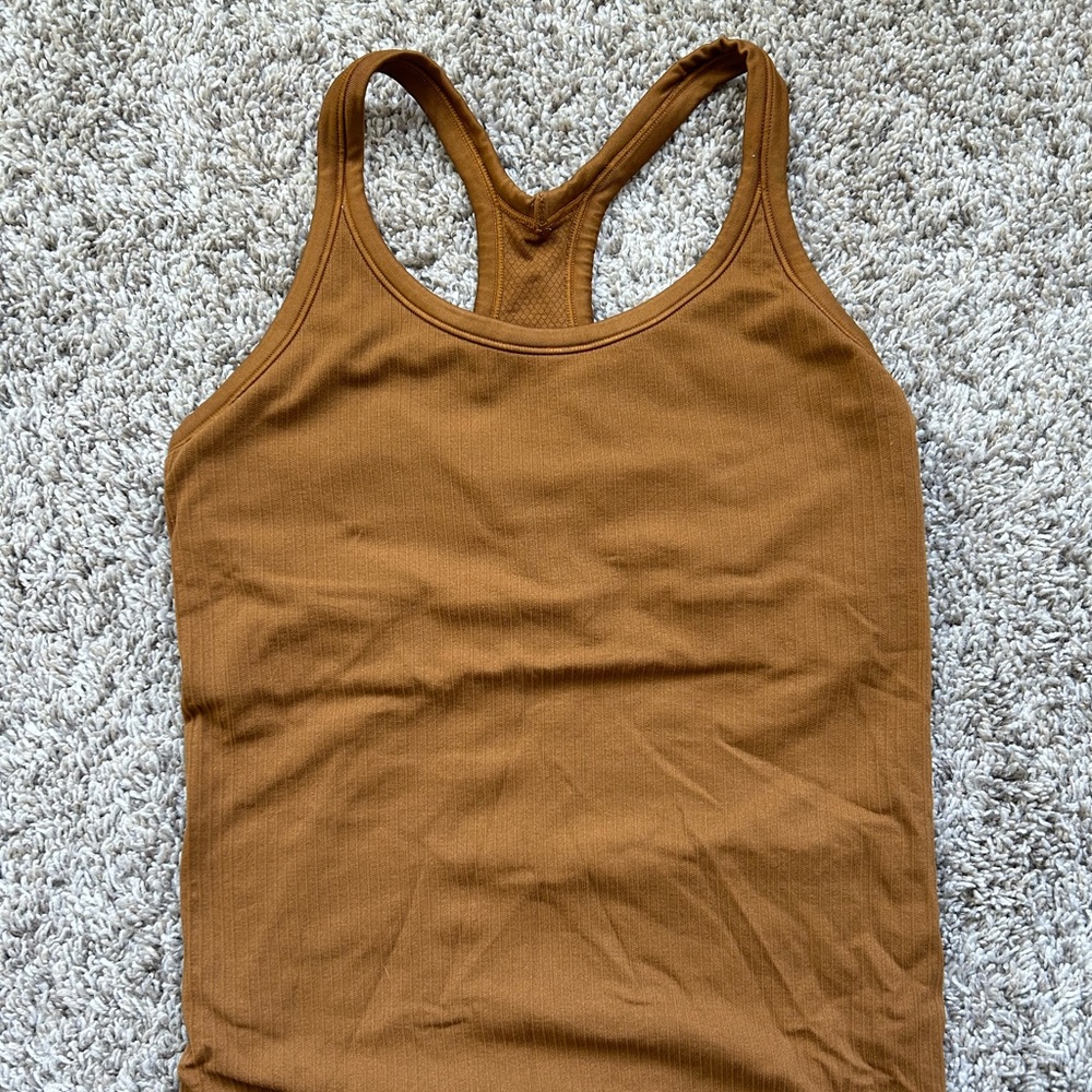 Tank Size 6. Burnt Orange/Camel color.